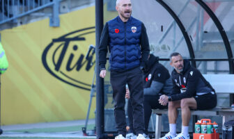 Head coach of Ottawa during a game.